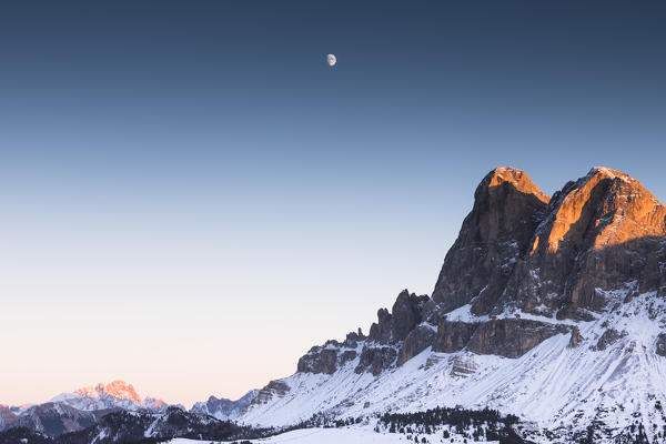Sunset over the Peitlerkofel (Sas Putia) with the moon in yhe background, Bolzano province, South Tyrol, Trentino Alto Adige, Italy