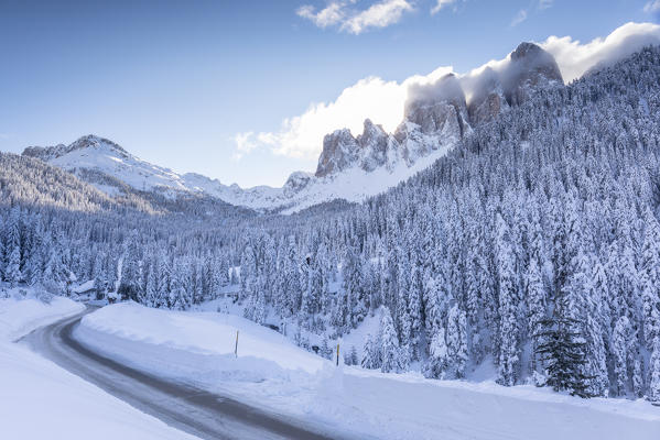 The road to Zanseralm (Zannes) in Villnöss with Geisler Group in background, Bolzano province, Trentino Alto Adige, Italy,