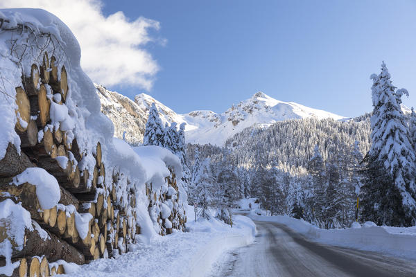 The road to Zanseralm (Zannes) in Villnöss with Geisler Group in background, Bolzano province, Trentino Alto Adige, Italy,