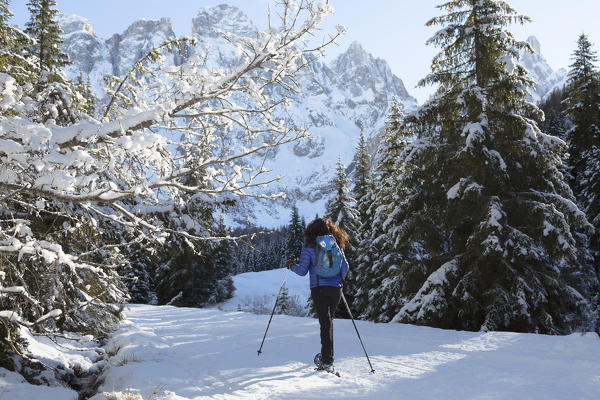a winter trekking in Venegia Valley with snowshoes, Trento province, Trentino, Italy, Europe