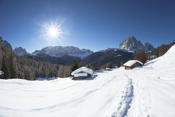 a winter view in backlight along a winter path in Val Gardena, Bolzano province, South Tyrol, Trentino Alto Adige, Italy, Europe
