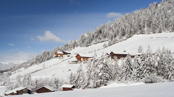 a view of a typical Villnöss surroundings after a snowfall with old farmsteads, Villnöss, Bolzano province, South Tyrol, Trentino Alto Adige, Italy, Europe