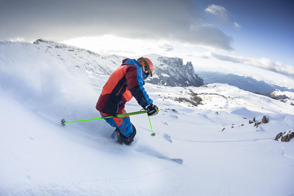 winter view of the Seiser Alm with a skier in a off-piste, Bolzano province, South Tyrol, Trentino Alto Adige, Italy, Europe