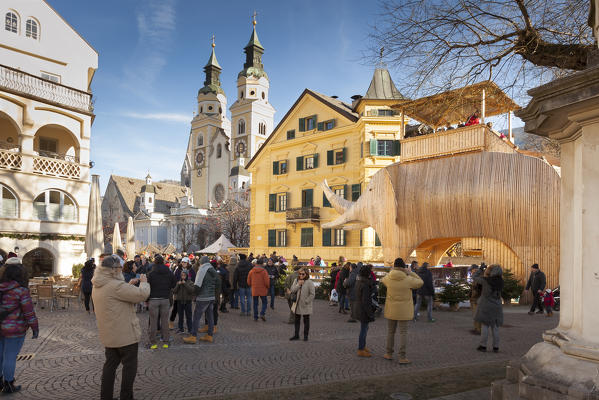 a view of the Dom square in the city of Brixen with a gigantic wood statue of the elephant called Soliman during the Christmas market, Bolzano province, South Tyrol Trentino Alto Adige, Italy, Europe