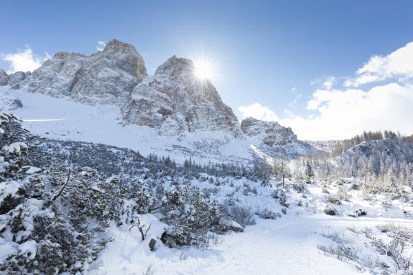a view of the Monte Pelmo with the sun coming out from behind