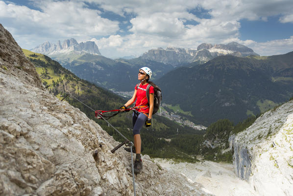 a climber looking the Panorama during a via ferrata, Trento province, Trentino Alto Adige. Italy, 