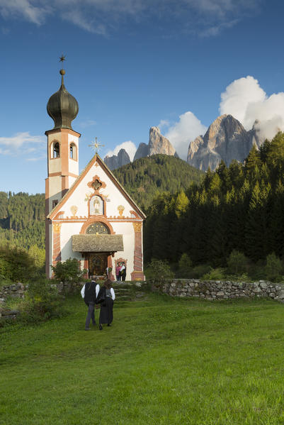 the beautiful church of Ranui with the Geisler Group (Odle) in the background, Bolzano province, South Tyrol, Trentino Alto Adige, Italy, 