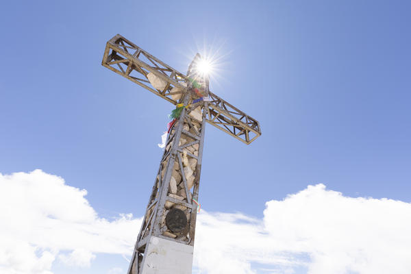 a suggestive view of the cross on the Tofana di Rozes Peak, Belluno province, Veneto, Italy
