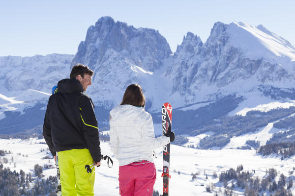 two skier are in front of the Langkofel Group in a beautiful sunny day, Bolzano province, South Tyrol, Trentino Alto Adige, Italy (MR)