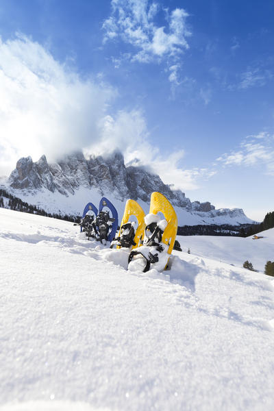 a view of snowshoes in Villnössertal with the Geisler in the background, Bolzano province, South Tyrol, Trentino Alto Adige, Italy