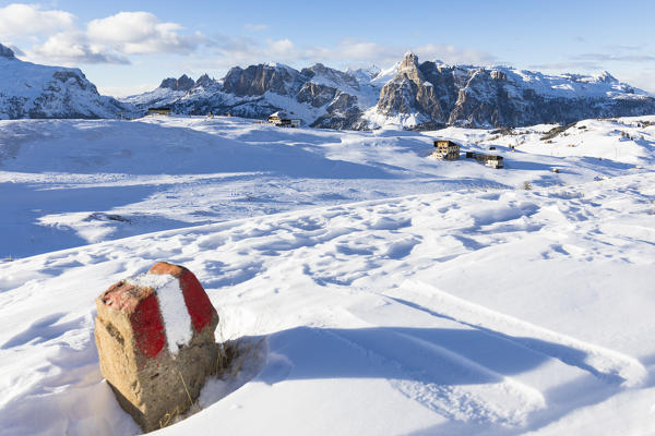 a view of the Pralongia Alpine pasture in Val Badia with sassongher Peak and the the Natural Park of Puez-Geisler in the background, Bolzano province, South Tyrol, Trentino Alto Adige, Italy