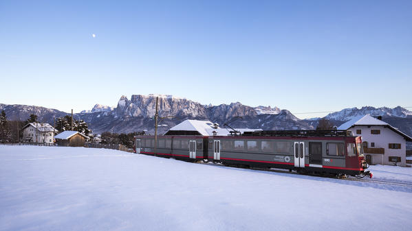 a view of the Renon’s historic narrow-gauge railway with the Schlern in the background, Bolzano province, South Tyrol, Trentino Alto Adige, Italy, Europe