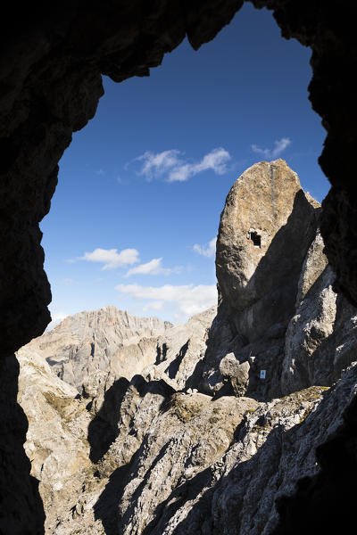 a view of the military observatory with a small window, along the via ferrata Bepi Zac into the Marmolada Group, along the battlefront of the World War One, Trento Province, Trentino Alto Adige, Italy