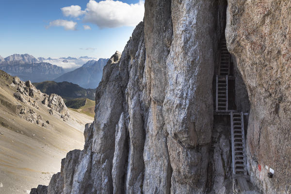 the stairs built into the rocks from the soldiers during the World War One, along the via ferrata Bepi Zac in the Marmolada Group, Trento Province, Trentino Alto Adige, Italy