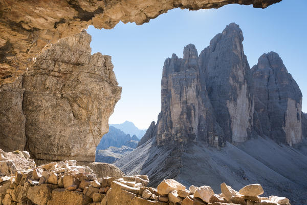 the Three Peaks seen from a natural window into the rocks along the ferrata of the Paternkofel, Sextner Dolomites,  bolzano province, south tyrol, trentino alto adige, italy,