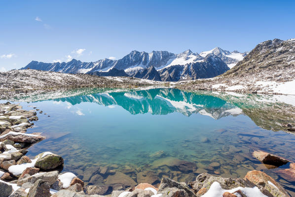 The turquoise Lake Rinnensee reflecting the Glaciers of the Stubai Alps, Neustift im Stubaital, Innsbruck Land, Tyrol, Austria, Europe