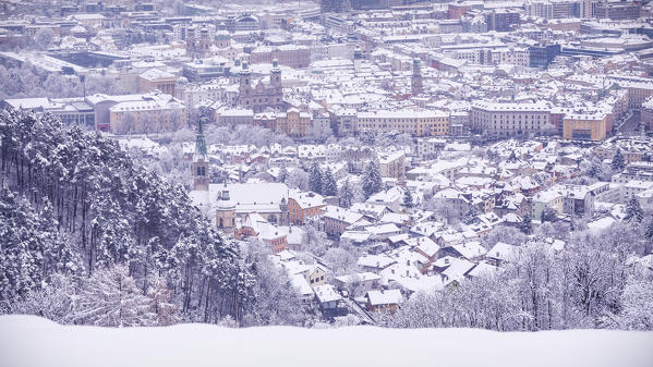 The snowy rooftops of Innsbruck seen from Planötzenhof, Innsbruck, Tyrol, Austria, Europe