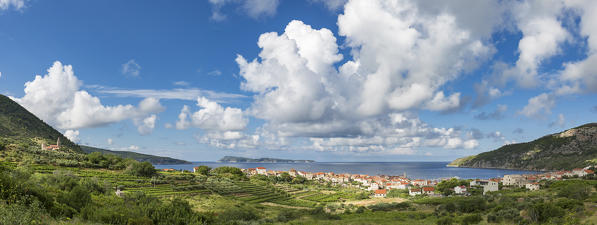 Panoramica view of Komiza village and its bay (Komiza, Vis, Vis Island, Split-Dalmatia county, Dalmatia region, Croatia, Europe)