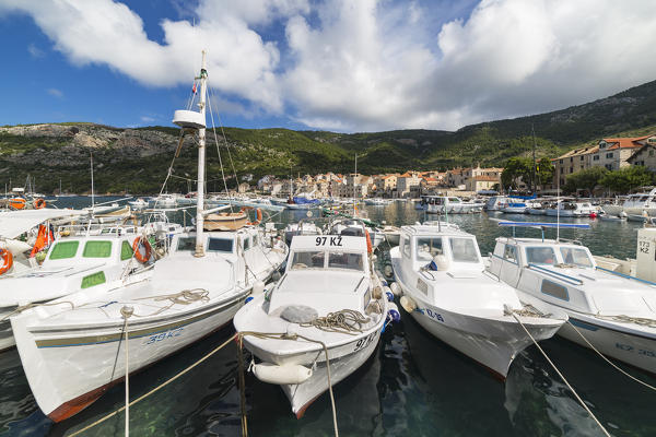 View of Komiza village and its port (Komiza, Vis, Vis Island, Split-Dalmatia county, Dalmatia region, Croatia, Europe)