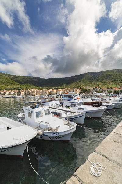 View of Komiza village and its port (Komiza, Vis, Vis Island, Split-Dalmatia county, Dalmatia region, Croatia, Europe)
