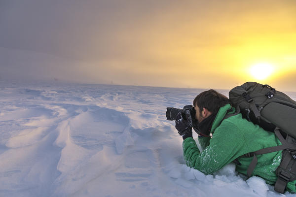 Photographer at Pallas-Yllastunturi National Park (Muonio, Lapland, Finland, Europe) (MR)