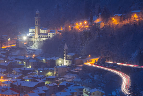 Churches at night. Sondalo, Sondrio district, Valtellina, Lombardy, Italy.