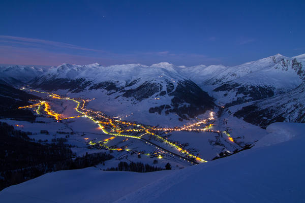 Europe, Italy, Lombardy, Sondrio. Livigno, famous tourist winter destination in the italian Alps, by night  