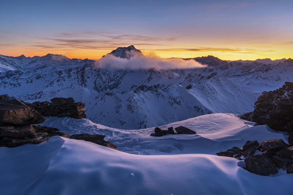 Alpine landscape a winter sunset. Vallombrina mount, Gavia pass, Santa Caterina Valfurva, Valtellina, Sondrio district, Lombardy, Italy, Europe.