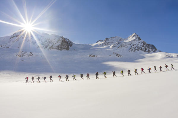 Ski mountaneers in the hochniochferner glacier. Austria, Europe.