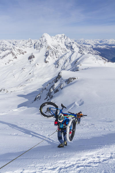 Cevedale mount, Valtellina, Central Alps, Lombardy, Italy. Fat bike in climbing to Cevedale mount