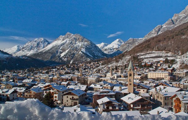 Bormio alpine town during winter after a snowfall. Bormio, Sondrio province, Valtellina valley, Lombardy, Italy