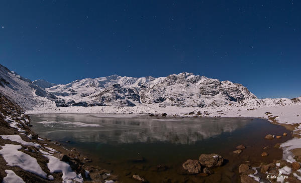 Rosole lake in Forni glacier during a full moon night 