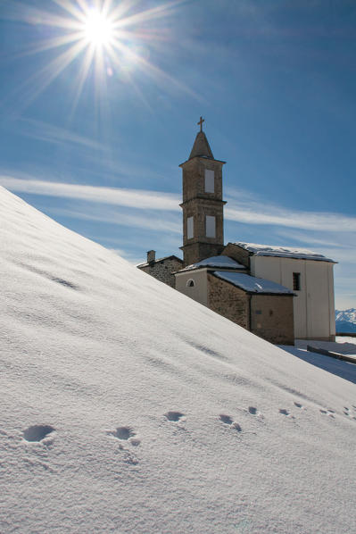 Pompei church's during winter at Mortirolo pass. Valtellina - Lombardy