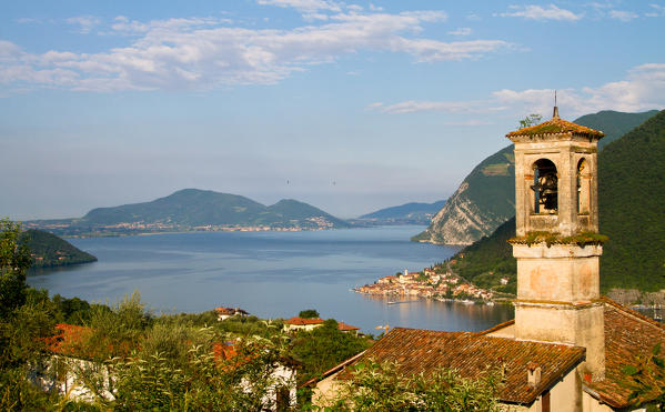 Europe, Italy, Lombardy. Iseo lake in Lombardy with the bell tower in the south side of lake