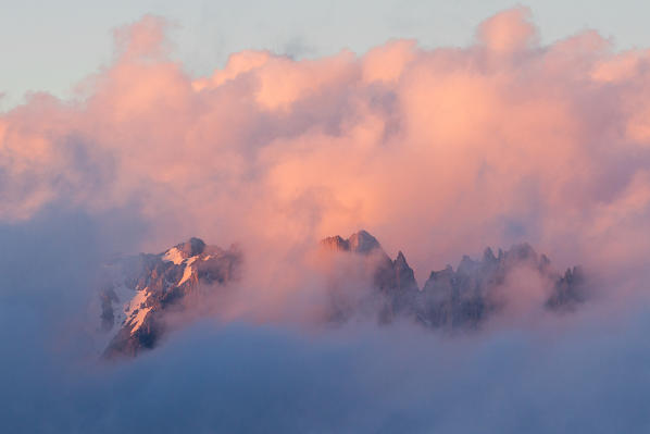 Europe, France, Pointes d'Orient. Amazing sunset with red clouds over mountains of France Alps