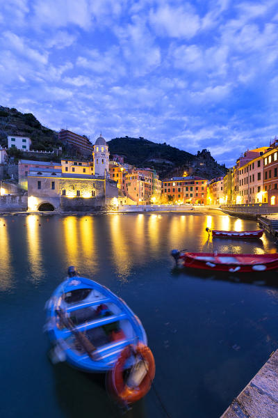 Moored boats in the port of Vernazza at dusk. Cinque Terre, Liguria, Italy, Europe.