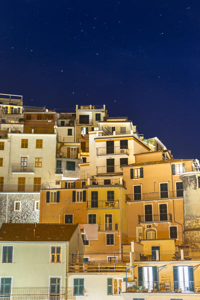 Colourful houses of Manarola at night. Cinque Terre, Liguria, Italy, Europe.