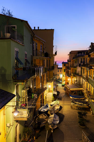 Twilight in the main street of Manarola, Cinque Terre, Liguria, Italy, Europe.