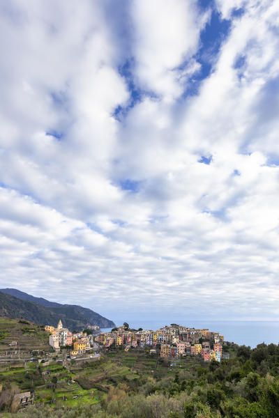 Stunning clouds above the village of Corniglia, Cinque Terre, Liguria, Italy, Europe.