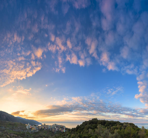 Stunning clouds above Corniglia at sunrise. Cinque Terre, Liguria, Italy, Europe.