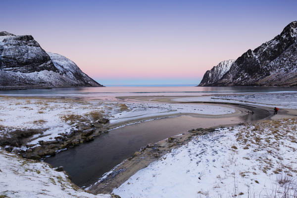 A river flows through Ersfjord Beach. Ersfjord, Ersfjorden, Senja, Norway, Europe.
