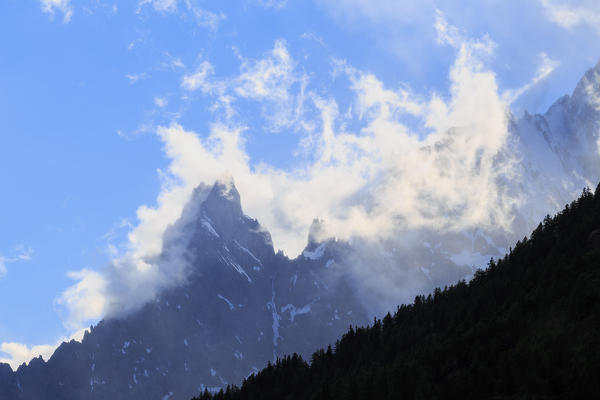 Aiguille Noire de Peuterey wrapped in clouds. Bonatti Hut, Ferret Valley, Courmayeur, Aosta Valley, Italy, Europe