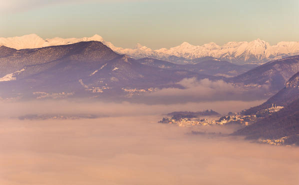 A view of Vacallo (Mendrisio district, Switzerland) from Brunate (Como province, Lombardy, Italy), wrapped by a sea of clouds, Europe