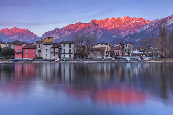 Sunset on Resegone mount reflected on Adda river, Pescarenico, Lecco province, Lombardy, Italy, Europe