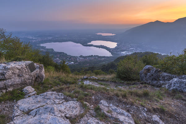 Sunset on Brianza and lake Annone from the top of Barro mount, Lecco province, Lombardy, Italy, Europe