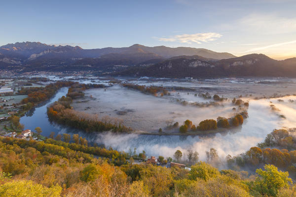 Autumn sunrise on Adda river, Airuno, Lecco province, Brianza, Lombardy, Italy, Europe