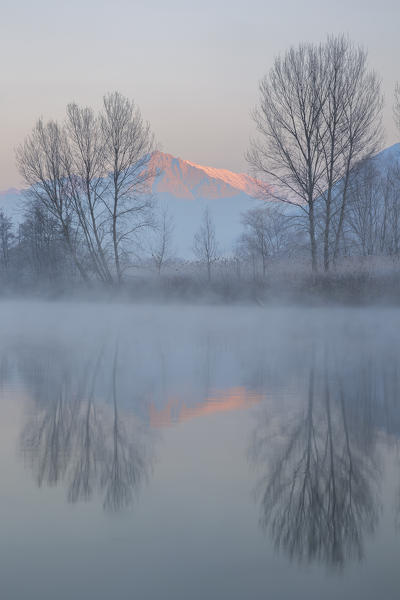 Foggy sunrise on Adda river, Airuno, Brianza, Lecco province, Lombardy, Italy, Europe
