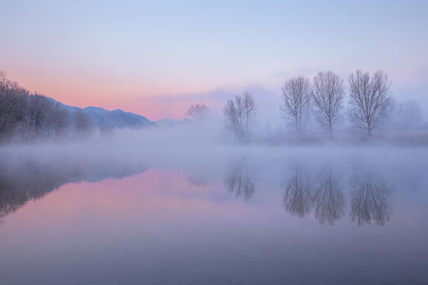 Foggy sunrise on Adda river, Airuno, Brianza, Lecco province, Lombardy, Italy, Europe