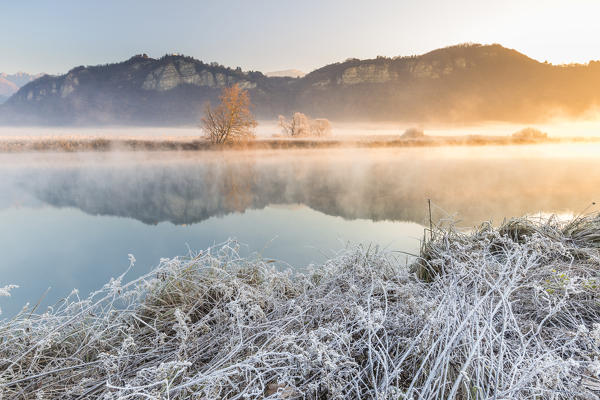 Frozen sunrise on Adda river, Airuno, Brianza, Lecco province, Lombardy, Italy, Europe