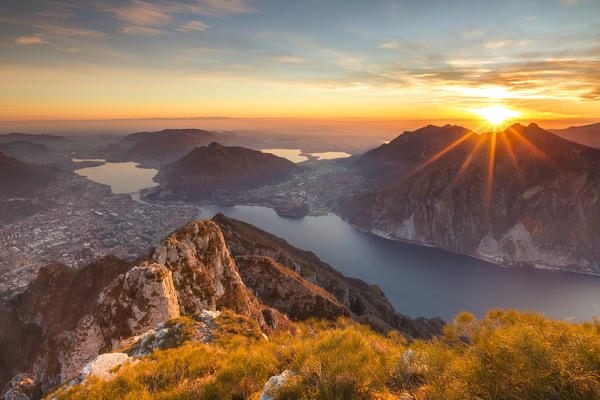 Sunset on Lecco and lake Como from the top of Coltignone mount, Lecco province, Lombardy, Italy, Europe